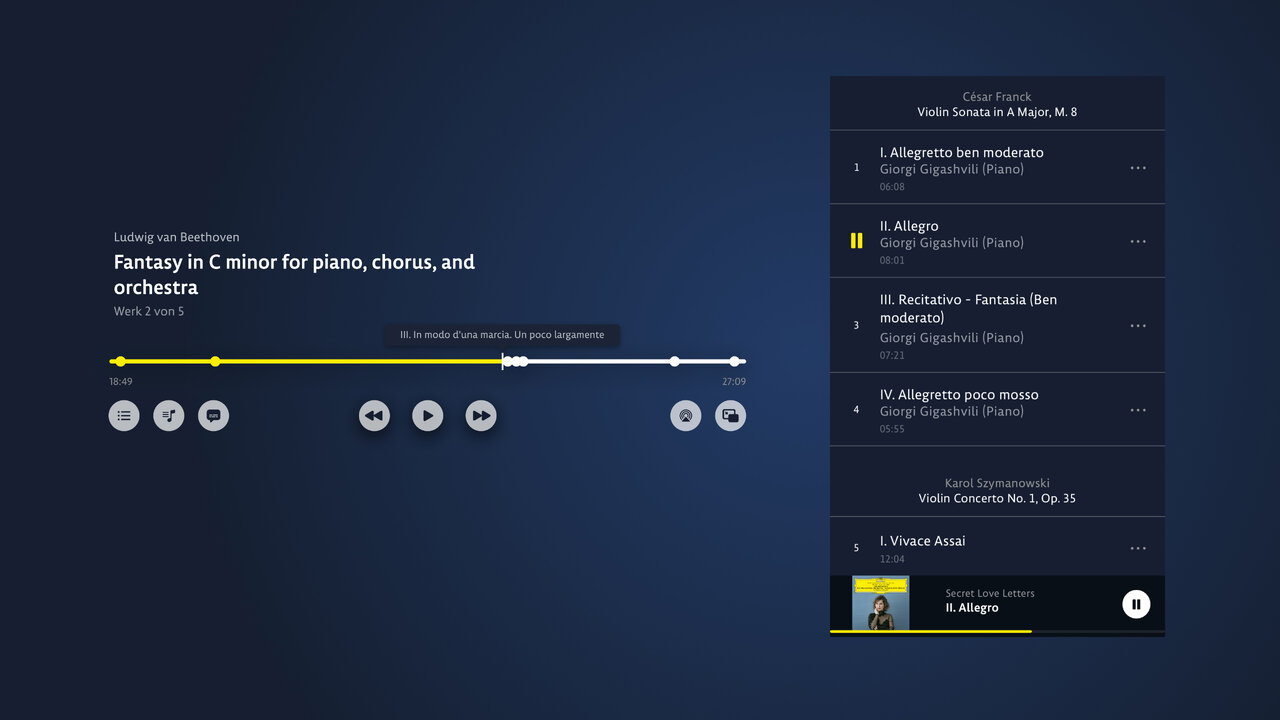 Ein Bildschirm der Streaming-Plattform Deutsche Grammophon mit einer Musikwiedergabeansicht f&uuml;r eine Fantasie in c-Moll f&uuml;r Klavier, Chor und Orchester. Die Benutzeroberfl&auml;che zeigt Wiedergabesteuerungen und eine Titelliste in einer dunkelblauen Farbpalette.