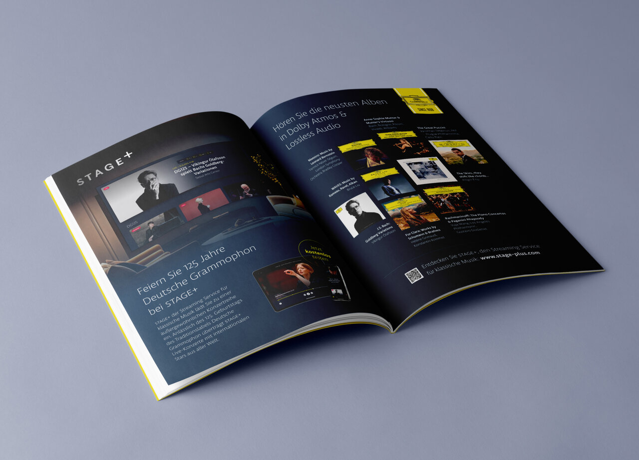 Aufgeschlagenes Magazin mit schwarz-gelber Designseite, das Webdesign und Projektdetails f&uuml;r einen audiovisuellen Streaming-Dienst der Deutschen Grammophon pr&auml;sentiert. Screenshots und Layout zeigen professionelles Branding und visuelle Kommunikationskonzept.